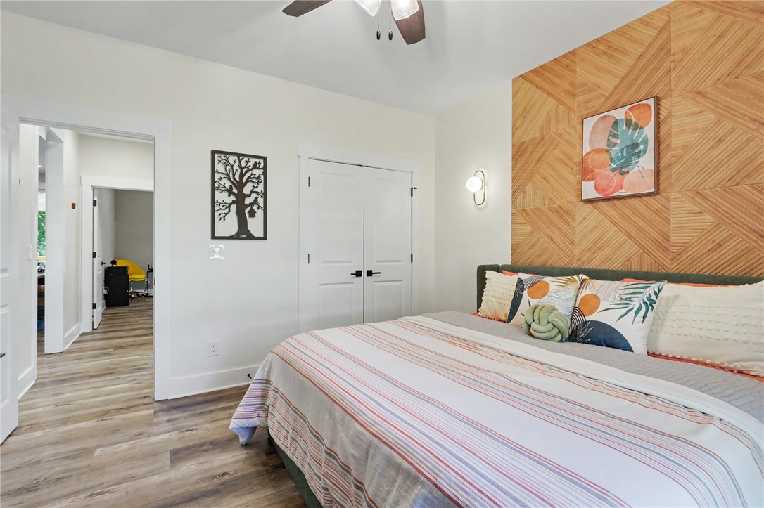 701 Coneross Creek Road Seneca, SC 29678 - Photo 24 of 35 A second view highlights the bedroom’s comfortable size and distinctive geometric accent wall.