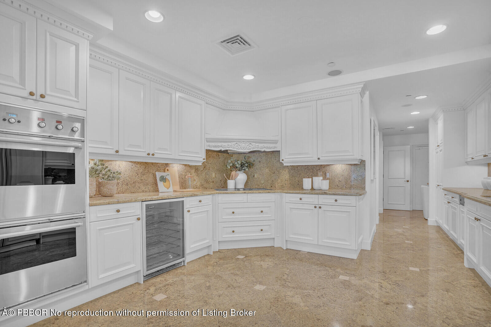 2 North Breakers Row, Unit ST2 Palm Beach, FL 33480 - Photo 11 of 30 a kitchen with granite countertop white cabinets and white stainless steel appliances