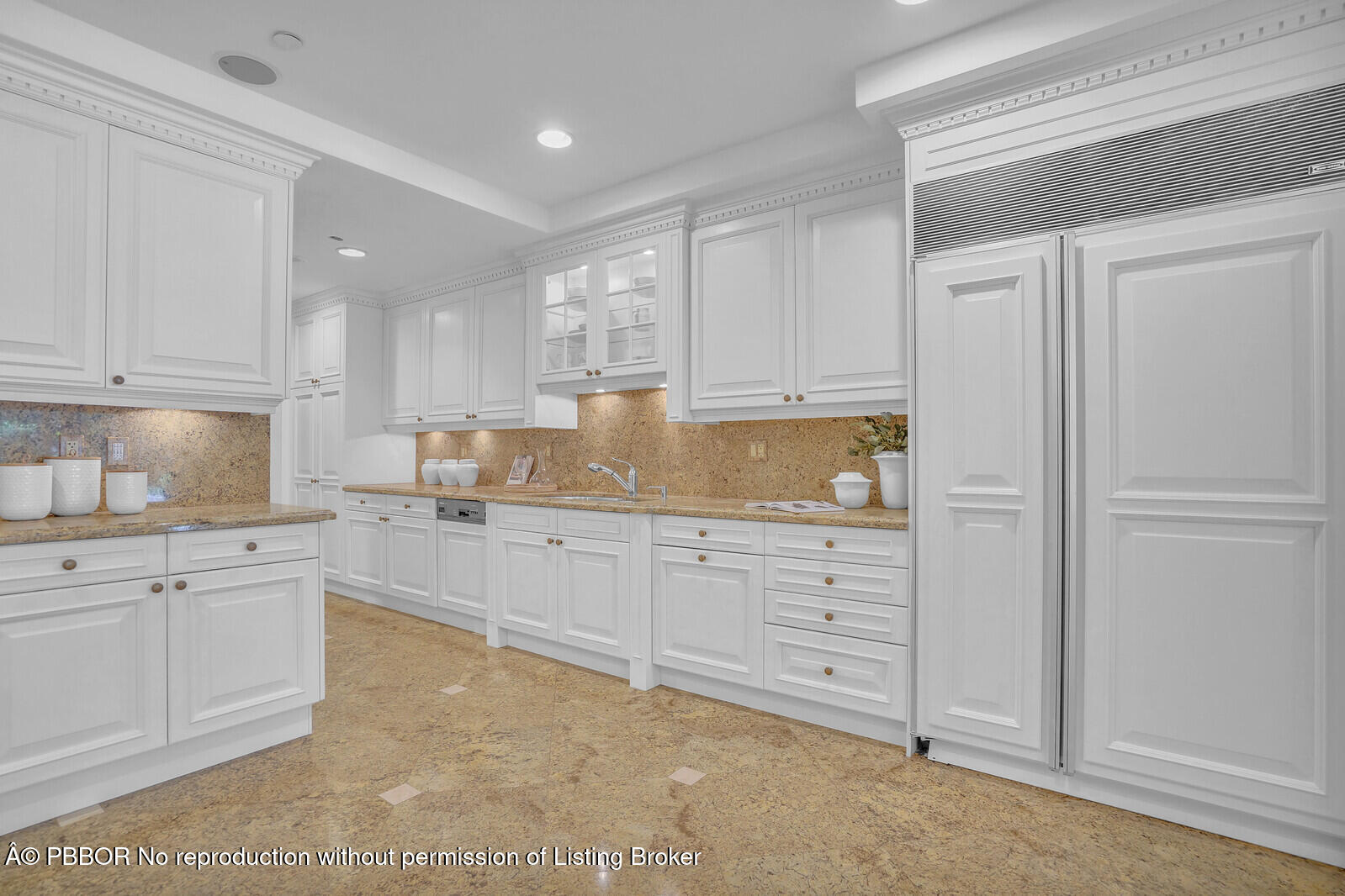 2 North Breakers Row, Unit ST2 Palm Beach, FL 33480 - Photo 12 of 30 a kitchen with granite countertop white cabinets and white stainless steel appliances