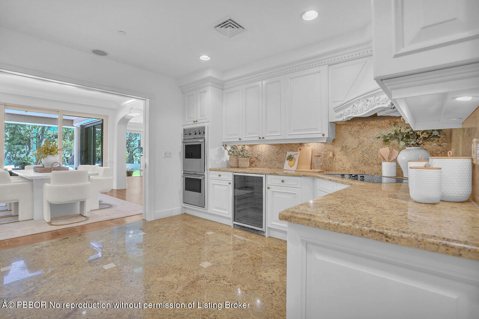 2 North Breakers Row, Unit ST2 Palm Beach, FL 33480 - Photo 13 of 30 a kitchen with a sink a stove and cabinets