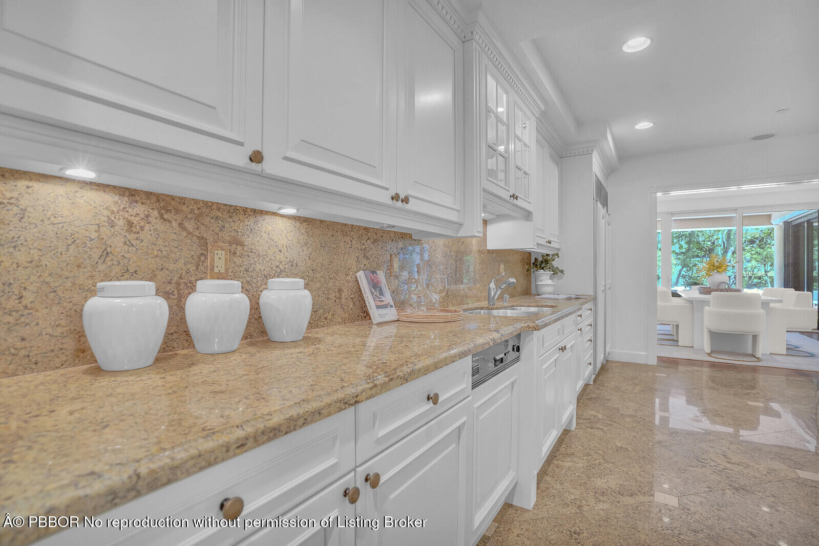 2 North Breakers Row, Unit ST2 Palm Beach, FL 33480 - Photo 14 of 30 a large kitchen with granite countertop a white counter top