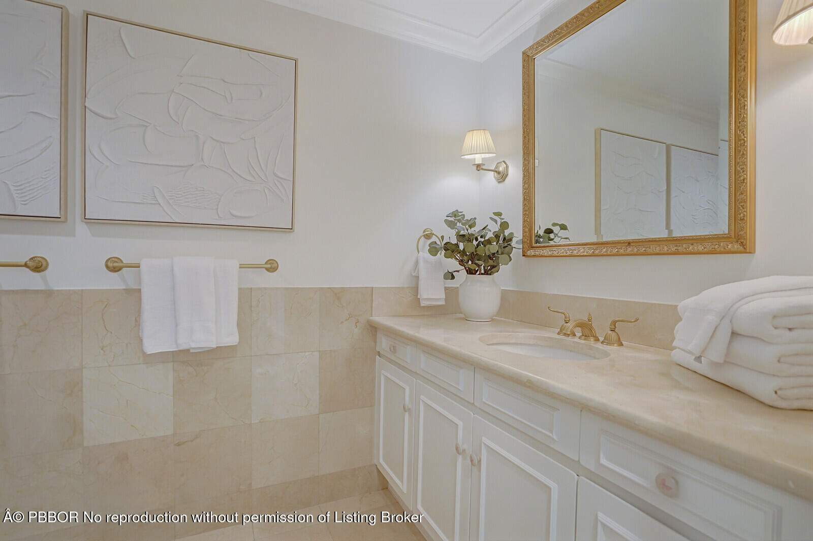 2 North Breakers Row, Unit ST2 Palm Beach, FL 33480 - Photo 22 of 30 a bathroom with a sink and a mirror