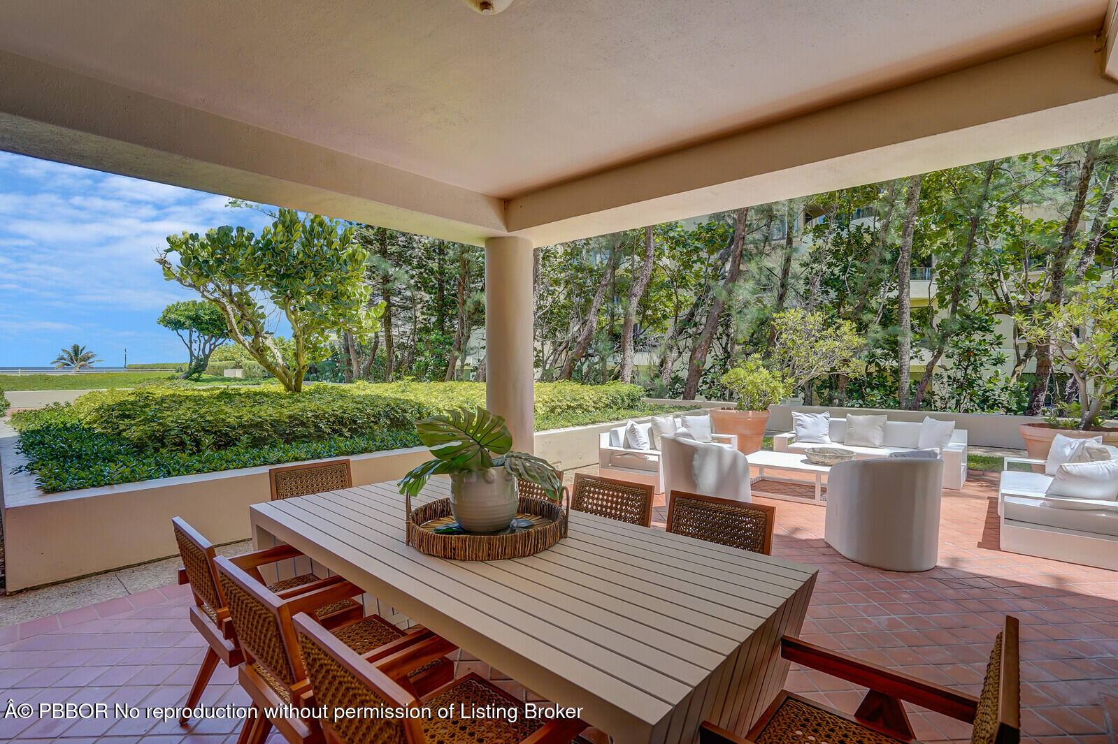 2 North Breakers Row, Unit ST2 Palm Beach, FL 33480 - Photo 26 of 30 a view of a patio with a dining table and chairs