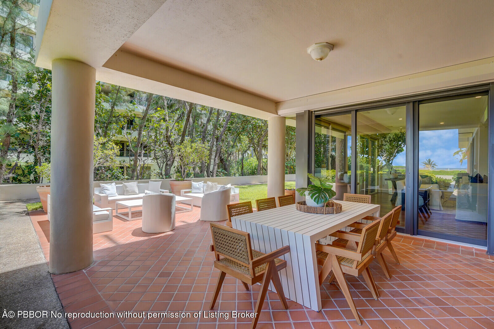 2 North Breakers Row, Unit ST2 Palm Beach, FL 33480 - Photo 27 of 30 a view of a dining room with furniture window and wooden floor