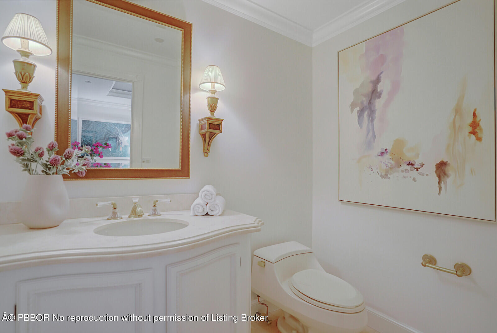 2 North Breakers Row, Unit ST2 Palm Beach, FL 33480 - Photo 3 of 30 a bathroom with a toilet sink and mirror