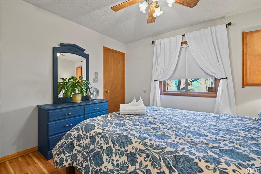 176 Stafford Drive Bushkill, PA 18324 - Photo 28 of 50 a bedroom with a bed and a window