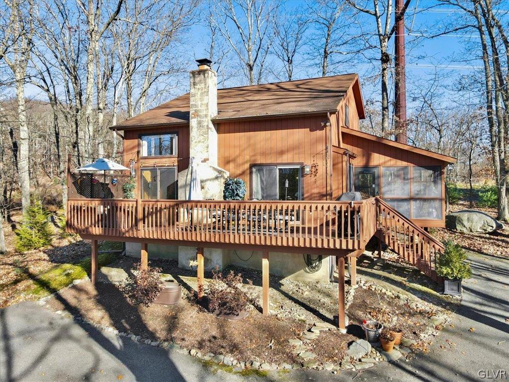 176 Stafford Drive Bushkill, PA 18324 - Photo 3 of 50 a view of a house with a wooden deck