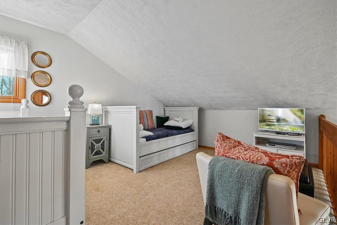 176 Stafford Drive Bushkill, PA 18324 - Photo 33 of 50 a living room with furniture and a window