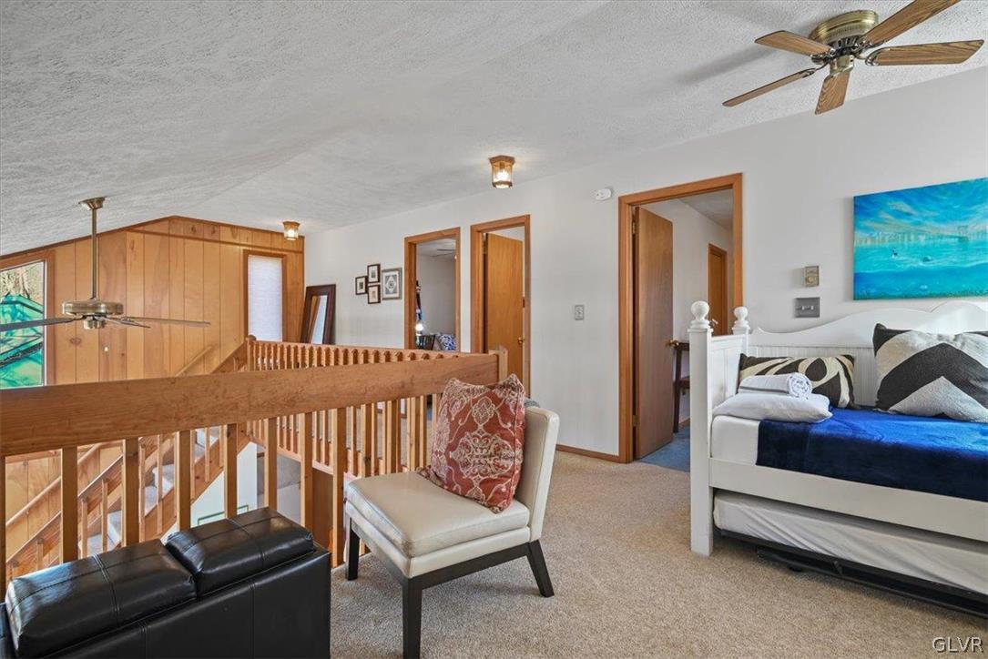 176 Stafford Drive Bushkill, PA 18324 - Photo 34 of 50 a bedroom with furniture and a wooden floor