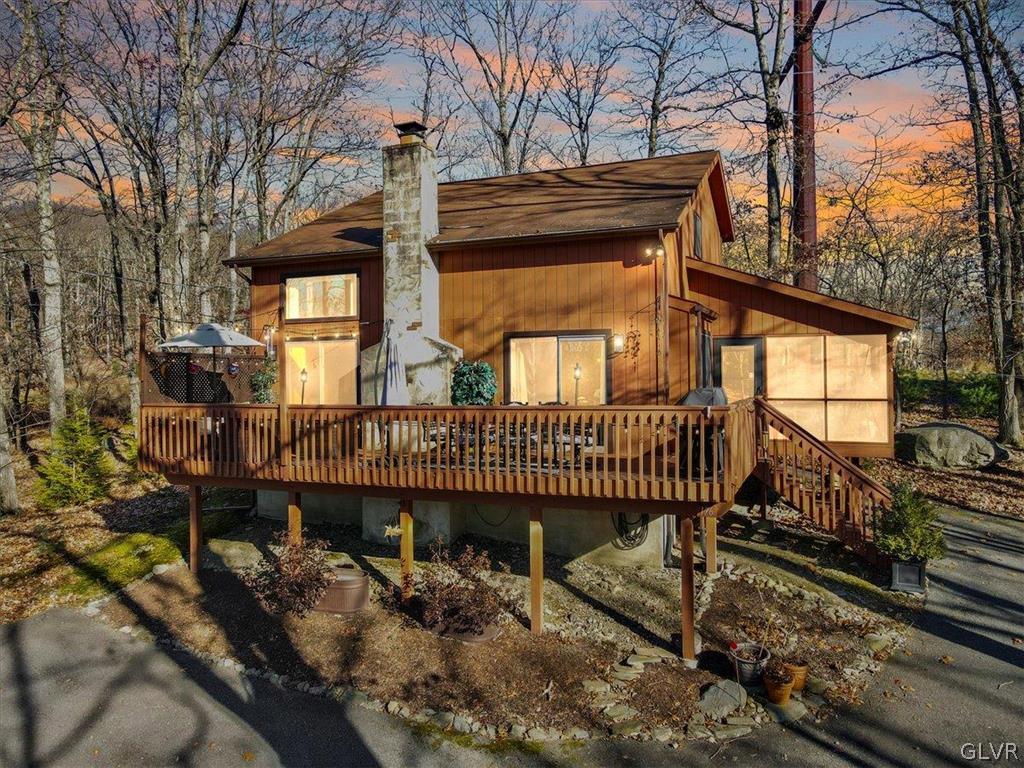 176 Stafford Drive Bushkill, PA 18324 - Photo 4 of 50 a view of a house with a wooden deck