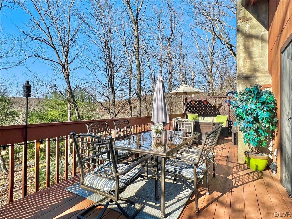176 Stafford Drive Bushkill, PA 18324 - Photo 42 of 50 a view of a balcony with chairs