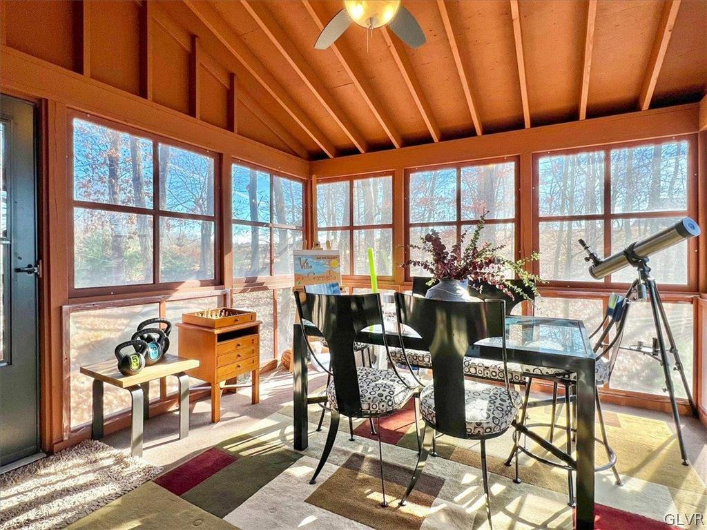 176 Stafford Drive Bushkill, PA 18324 - Photo 10 of 50 a dining room with furniture water view and wooden floor