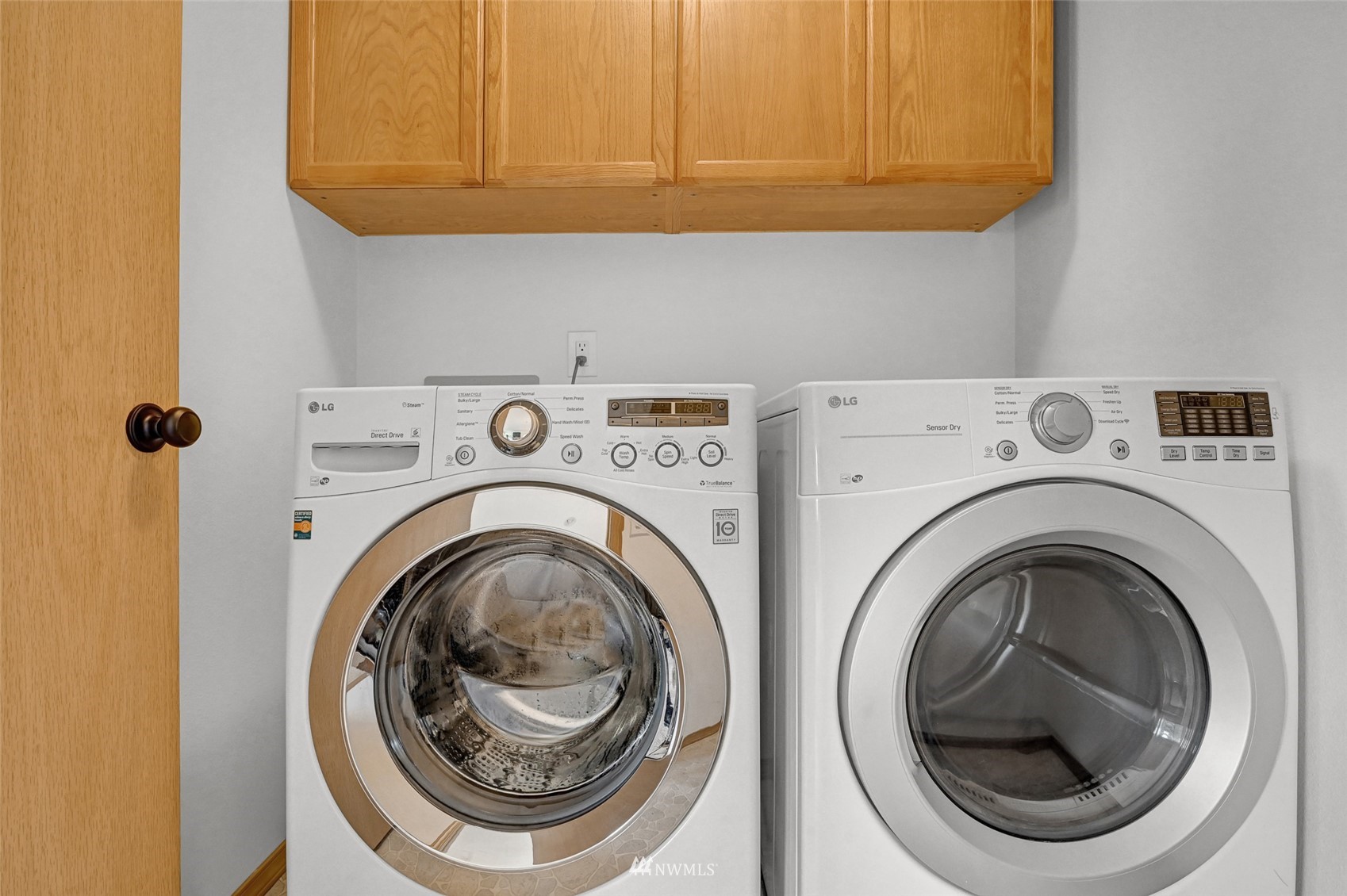 1422 243rd Place Southwest Bothell, WA 98021 - Photo 35 of 40 a utility room with dryer and washer
