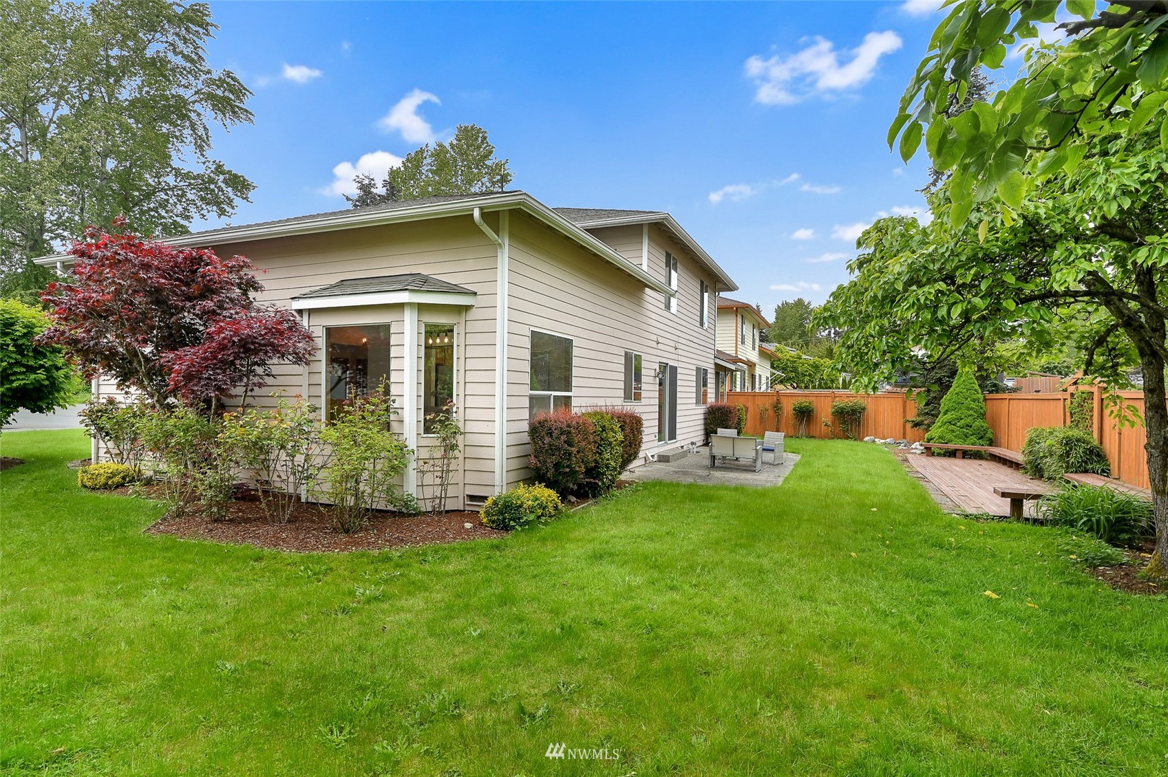 1422 243rd Place Southwest Bothell, WA 98021 - Photo 40 of 40 a front view of house with yard and green space