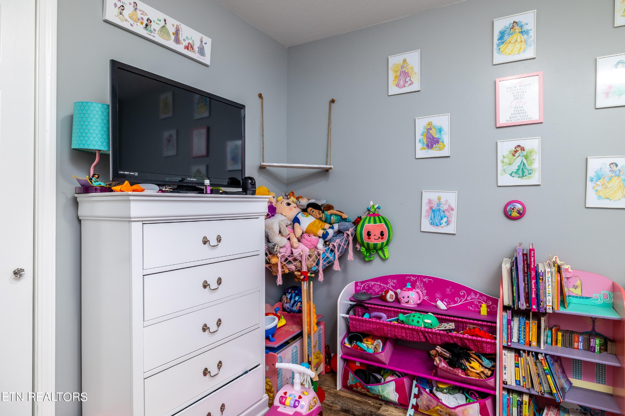 228 West Edison Street Alcoa, TN 37701 - Photo 17 of 24 a children room with furniture a flat screen tv and a bed