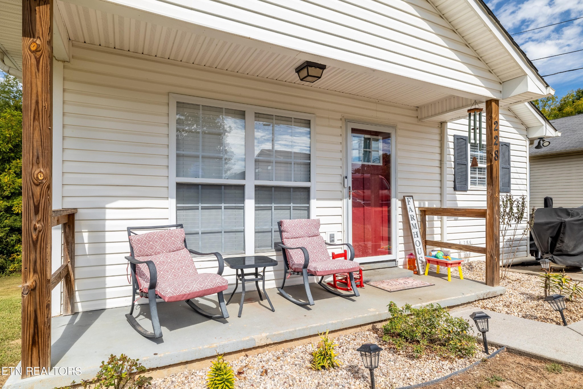 228 West Edison Street Alcoa, TN 37701 - Photo 3 of 24 a view of a chairs and table in a patio