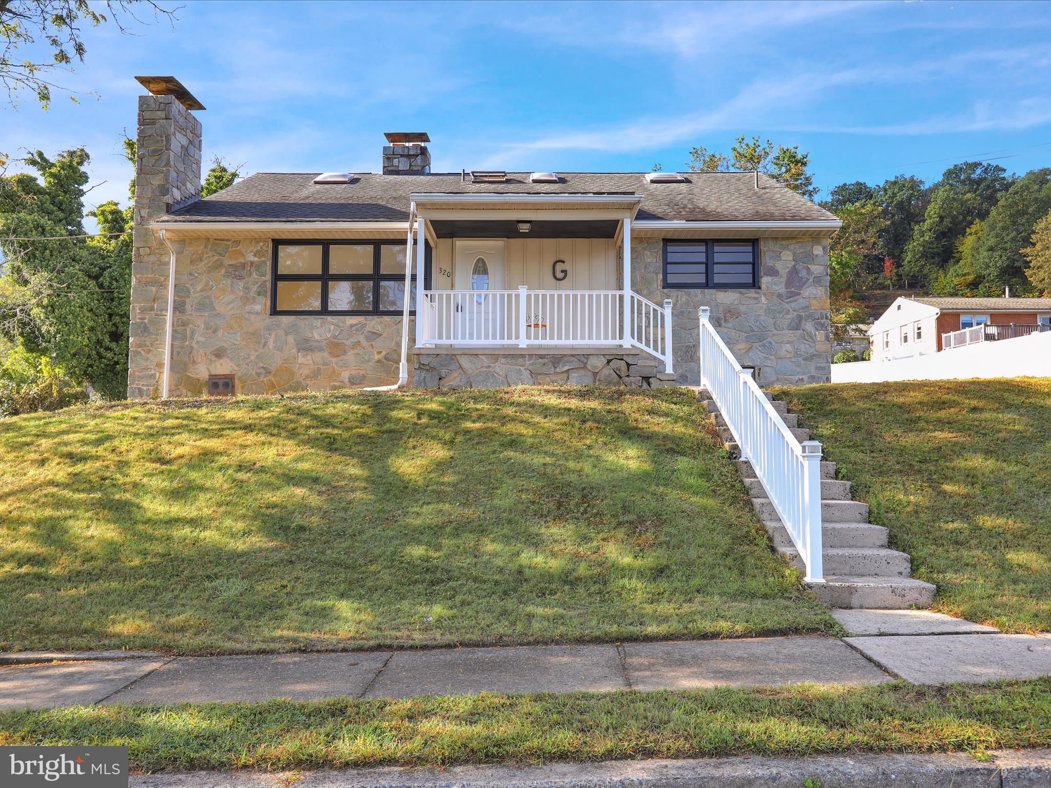 a view of a house with swimming pool