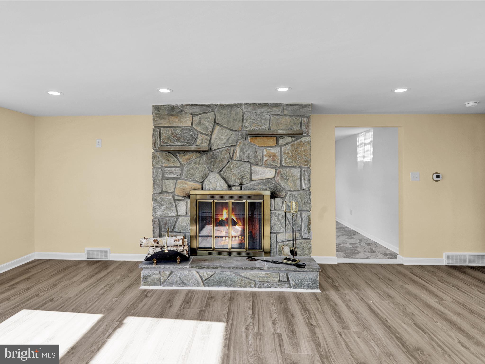 320 Hillside Drive Reading, PA 19607 - Photo 13 of 38 a living room with furniture and a fireplace