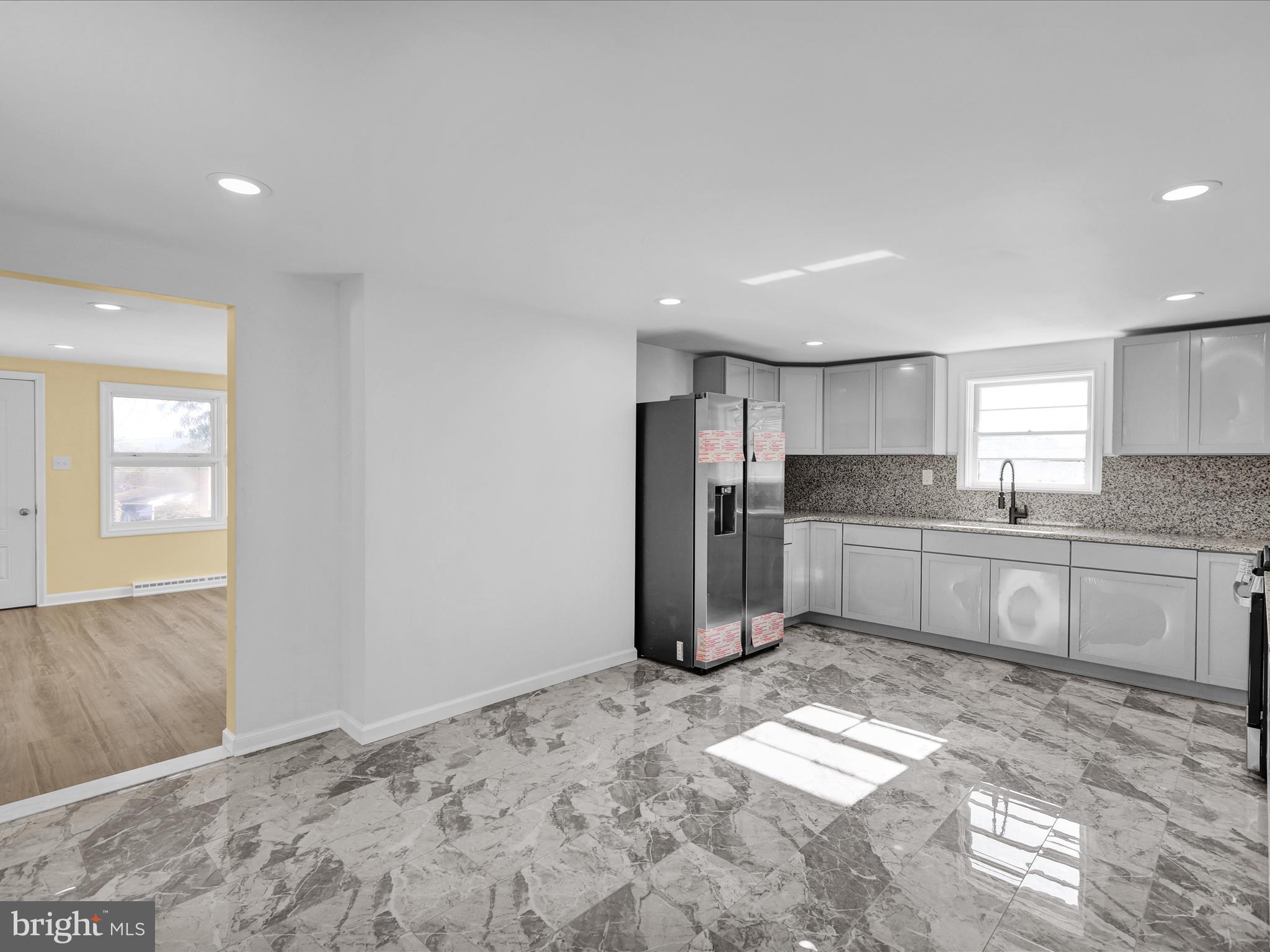 320 Hillside Drive Reading, PA 19607 - Photo 17 of 38 a kitchen with stainless steel appliances granite countertop a refrigerator sink and cabinets