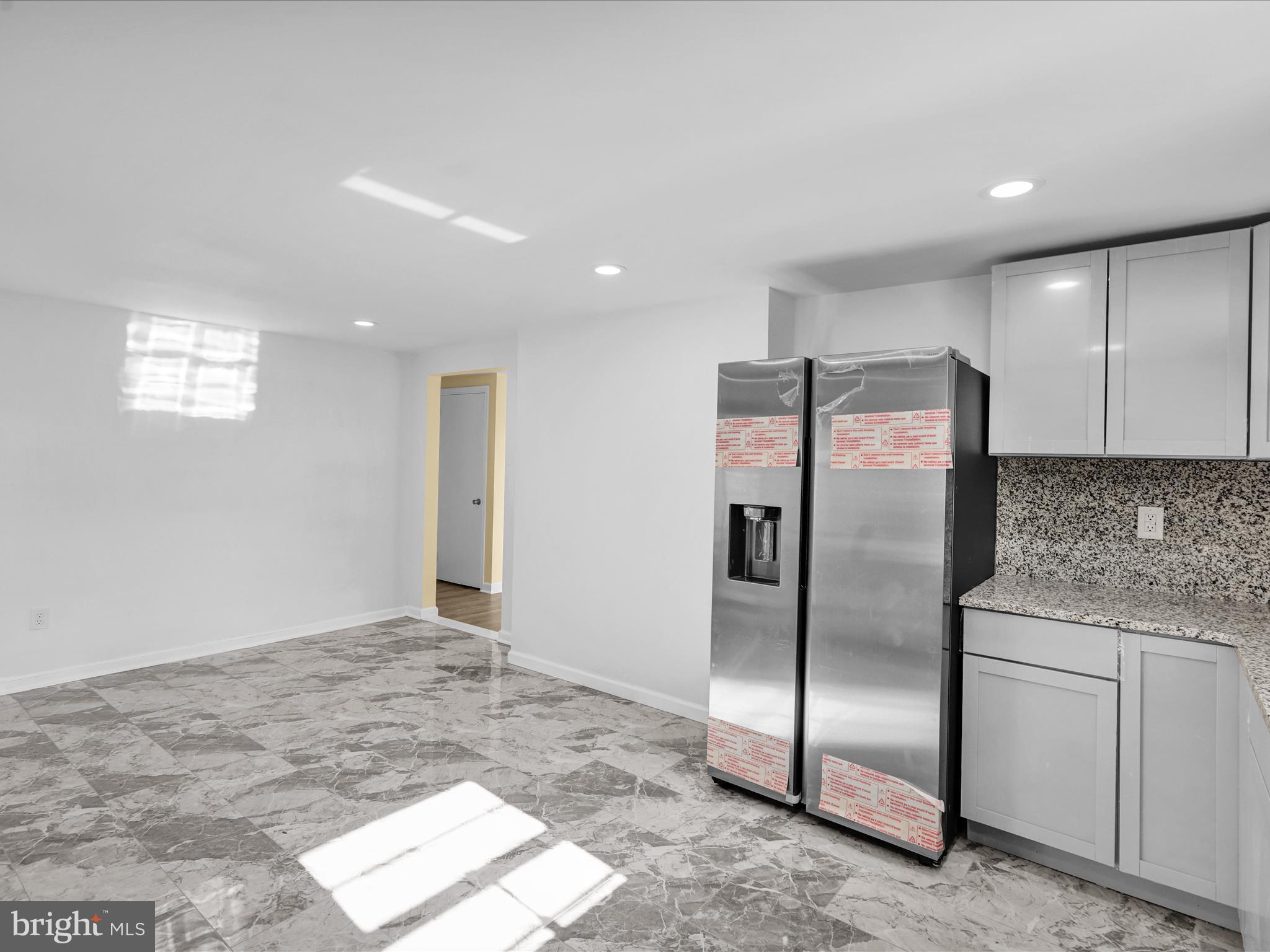 320 Hillside Drive Reading, PA 19607 - Photo 20 of 38 a kitchen with stainless steel appliances granite countertop a refrigerator and a sink
