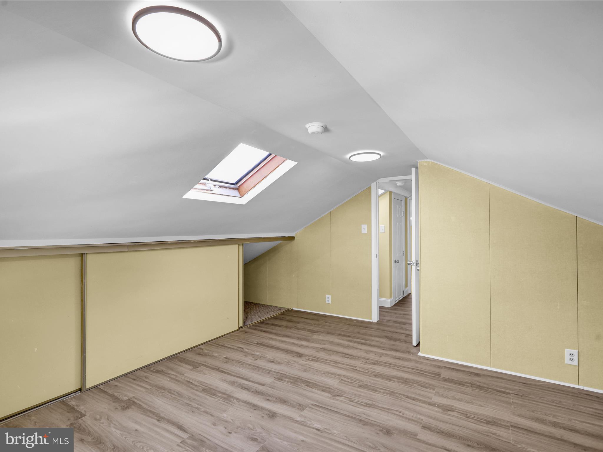 320 Hillside Drive Reading, PA 19607 - Photo 28 of 38 an empty room with wooden floor and windows