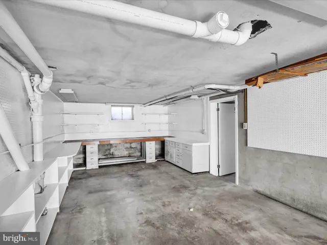 a view of wooden chairs and wooden floor