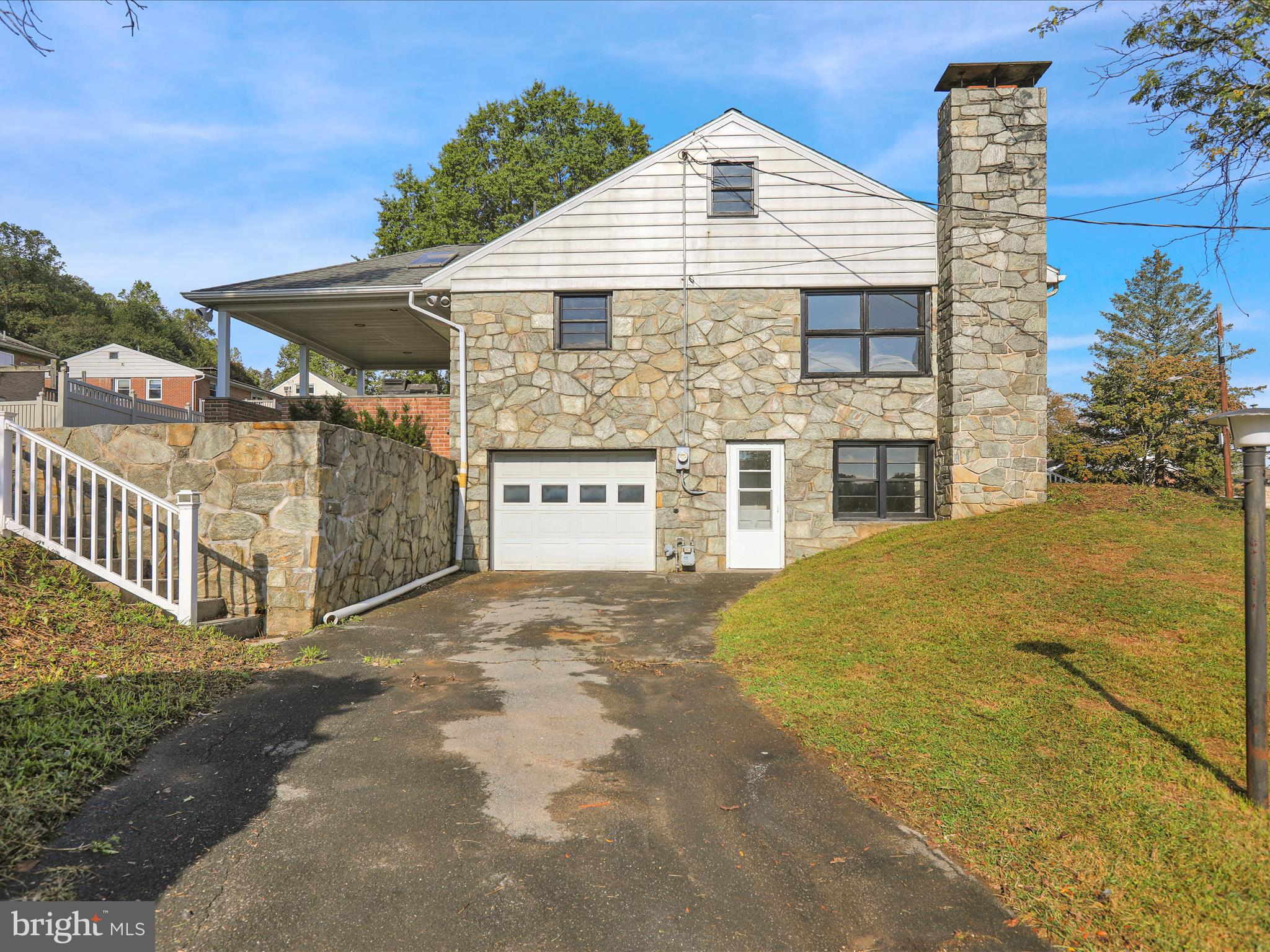 320 Hillside Drive Reading, PA 19607 - Photo 5 of 38 a view of a house with a outdoor space