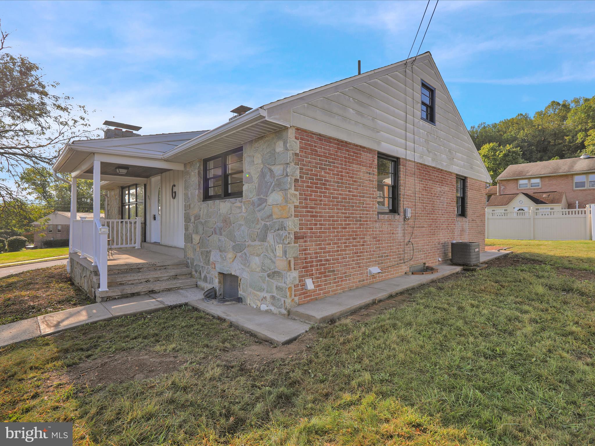 320 Hillside Drive Reading, PA 19607 - Photo 10 of 38 a view of a house with a yard