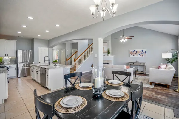 a kitchen with furniture and a view of kitchen