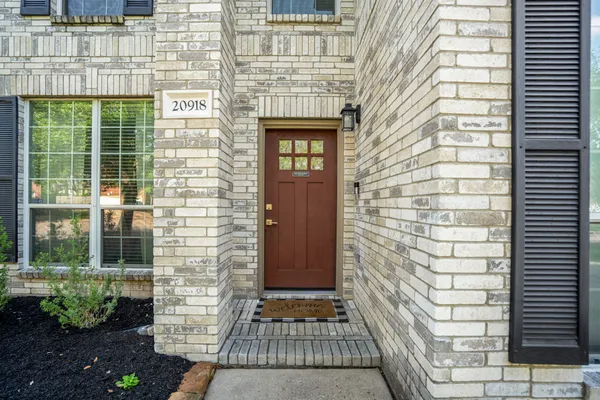 a view of a brick wall of the building