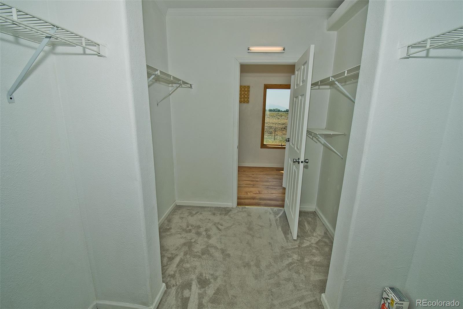 1372 North Saddlerock Trail Crestone, CO 81131 - Photo 29 of 43 a bathroom with a shower and a sink