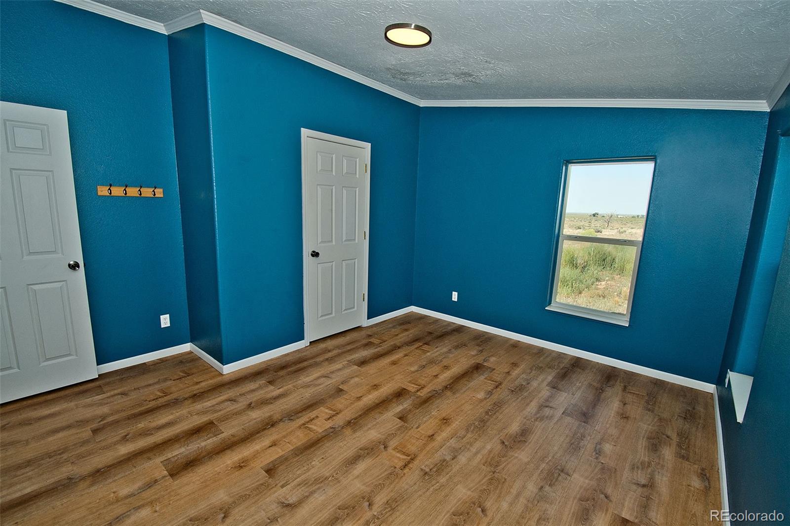 1372 North Saddlerock Trail Crestone, CO 81131 - Photo 37 of 43 a view of an empty room