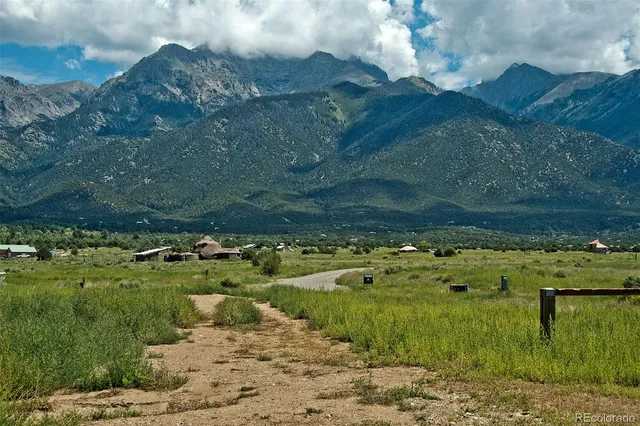 a view of a lake with a yard