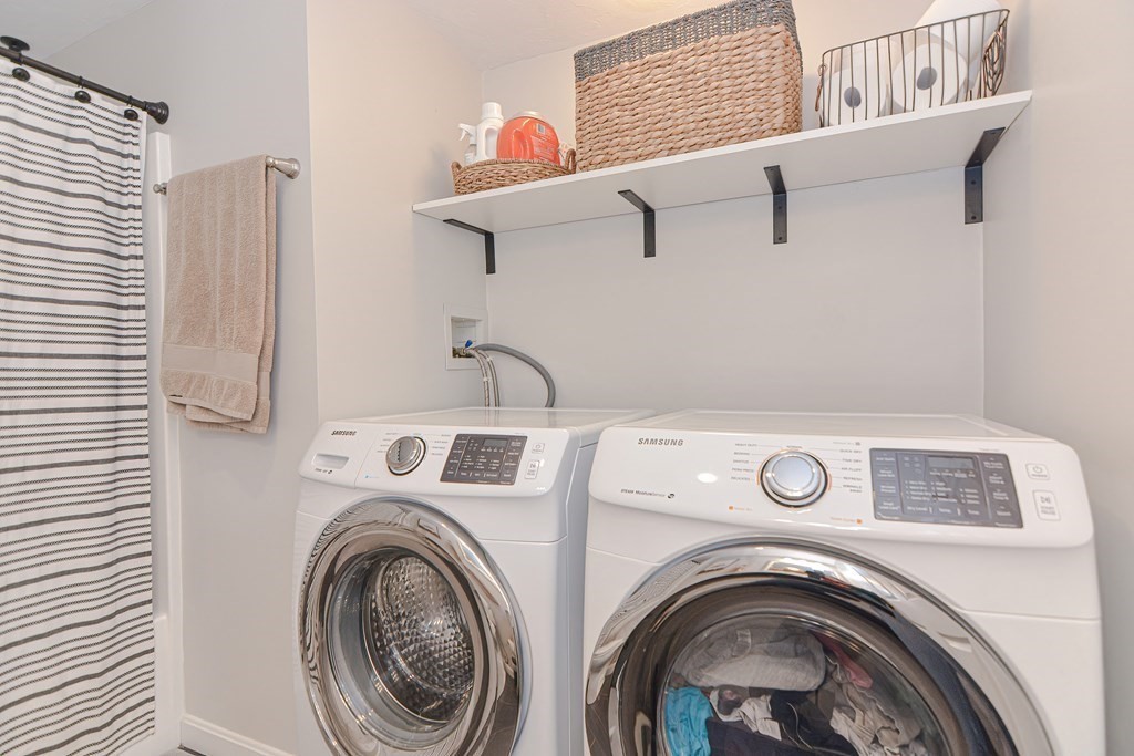 41 Boston Road, Unit 351 Billerica, MA 01862 - Photo 20 of 25 a utility room with dryer and washer