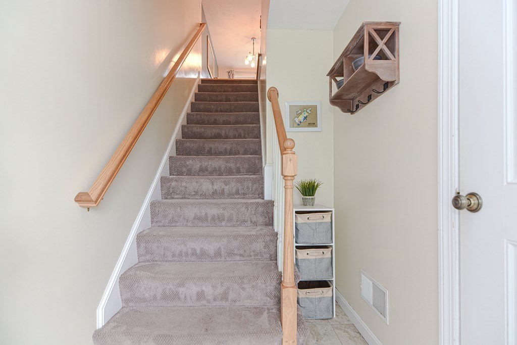 41 Boston Road, Unit 351 Billerica, MA 01862 - Photo 2 of 25 a view of staircase with white walls