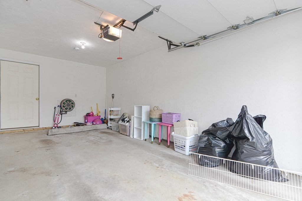 41 Boston Road, Unit 351 Billerica, MA 01862 - Photo 22 of 25 a view of a livingroom with workspace and a ceiling fan