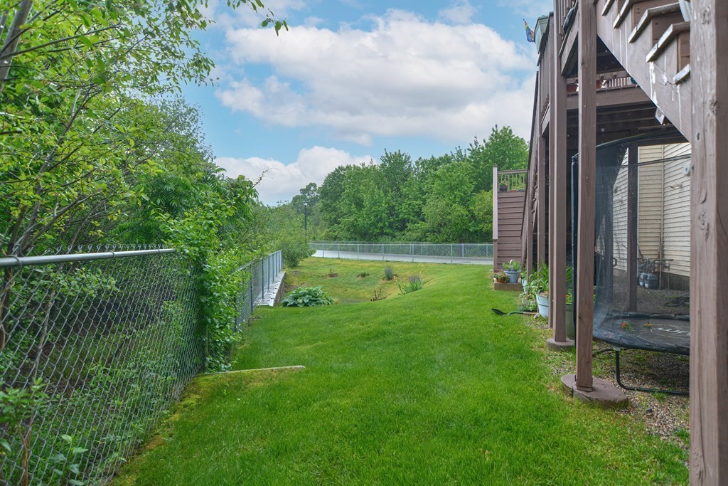 41 Boston Road, Unit 351 Billerica, MA 01862 - Photo 23 of 25 a view of a house with a backyard