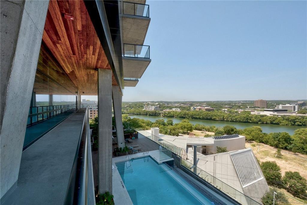 70 Rainey Street, Unit 1409 Austin, TX 78701 - Photo 33 of 38 View of pool featuring a balcony and a water view