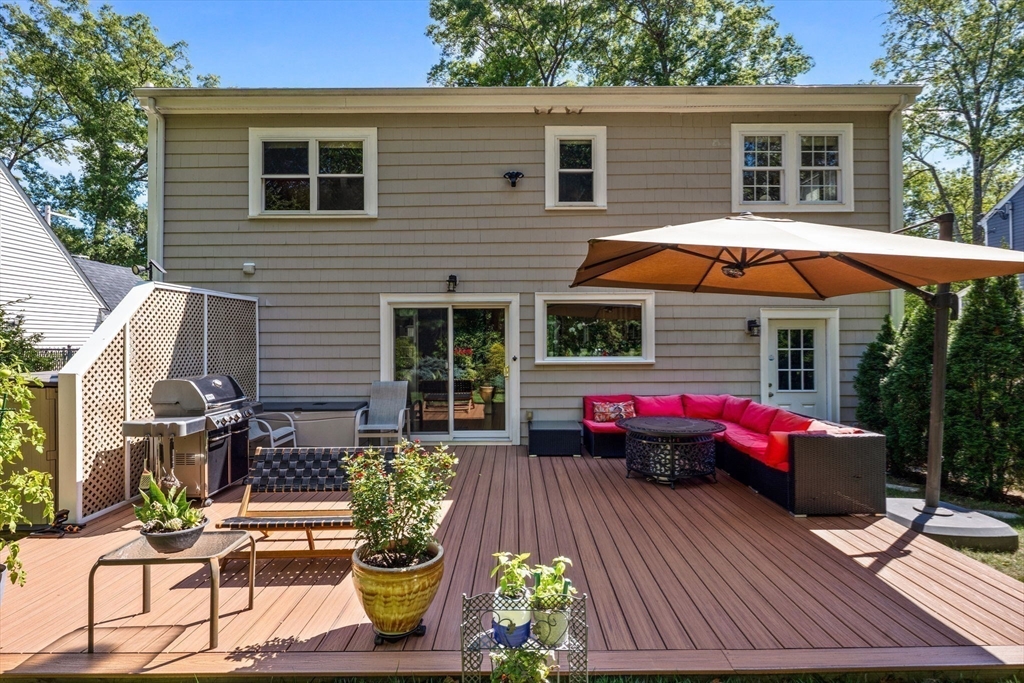 83 Payson Road Brookline, MA 02467 - Photo 33 of 34 a backyard of a house with seating space