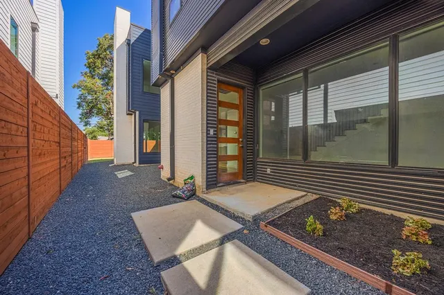 a view of house with a potted plant