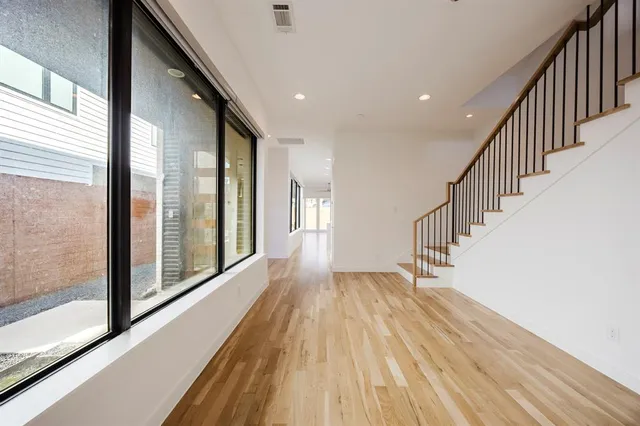 a view of entryway with wooden floor