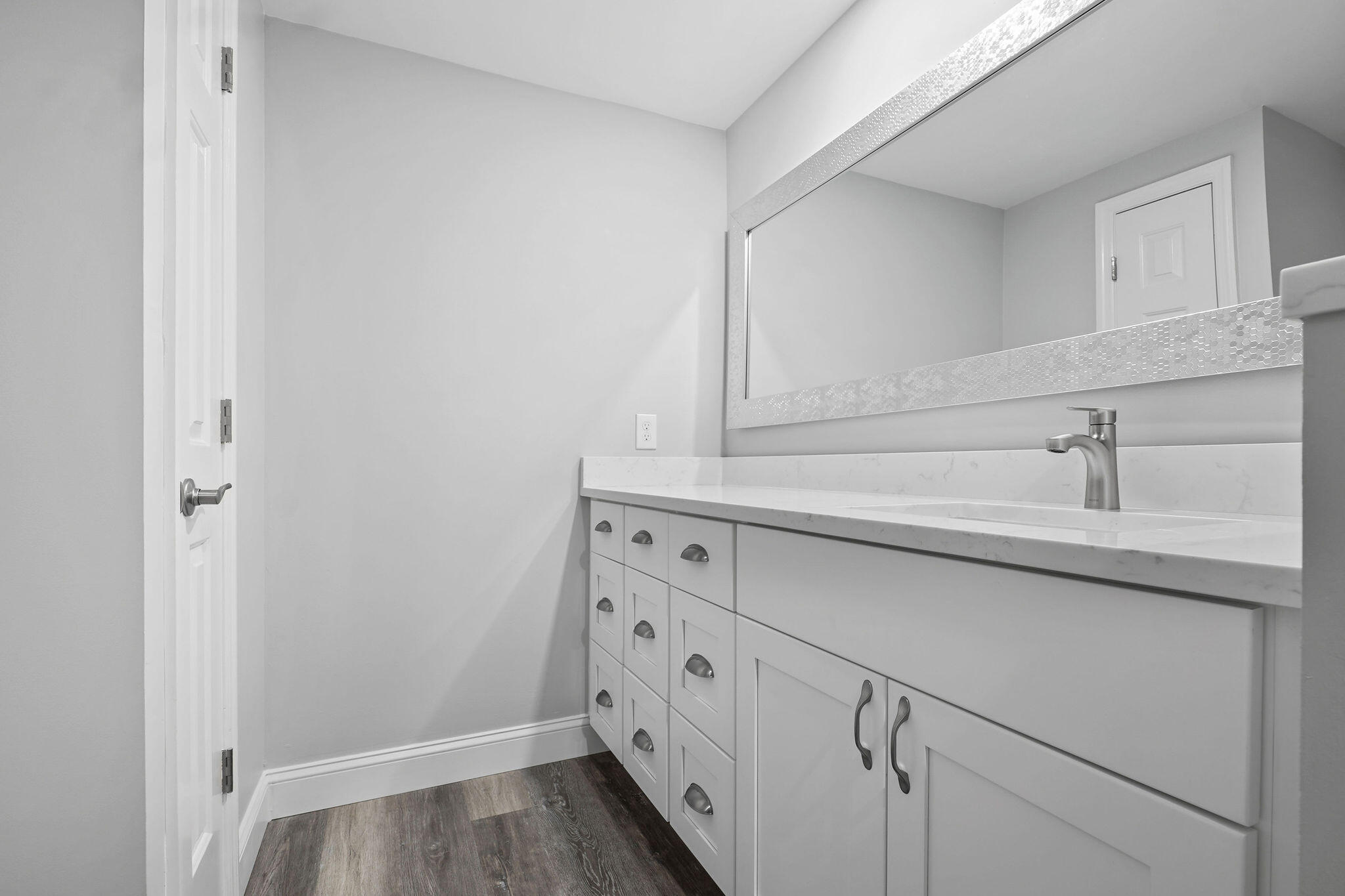 250 Southeast Four Winds Drive, Unit 204 Stuart, FL 34996 - Photo 14 of 32 a view of a sink with cabinets