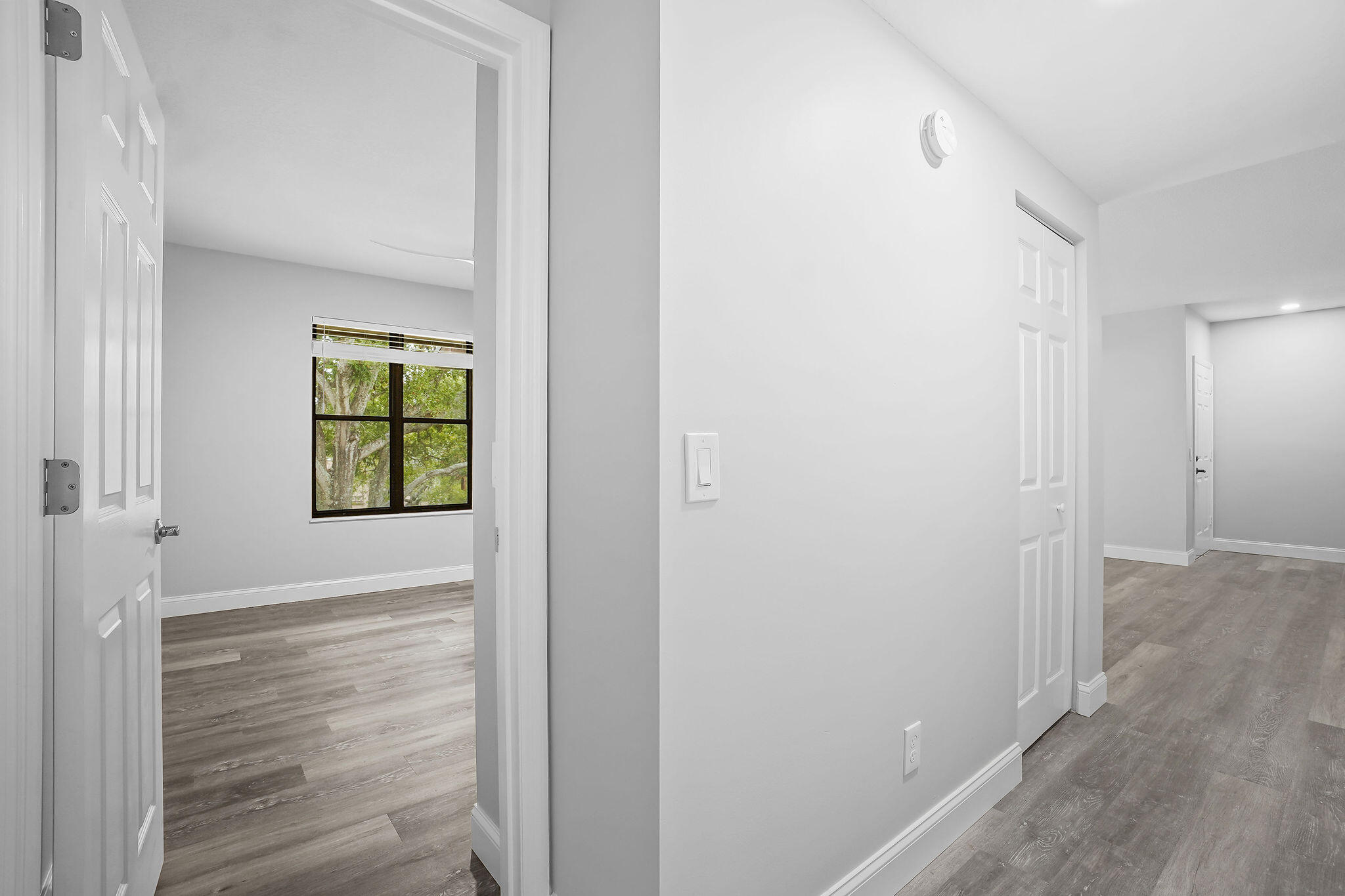 250 Southeast Four Winds Drive, Unit 204 Stuart, FL 34996 - Photo 15 of 32 a view of an entryway with wooden floor