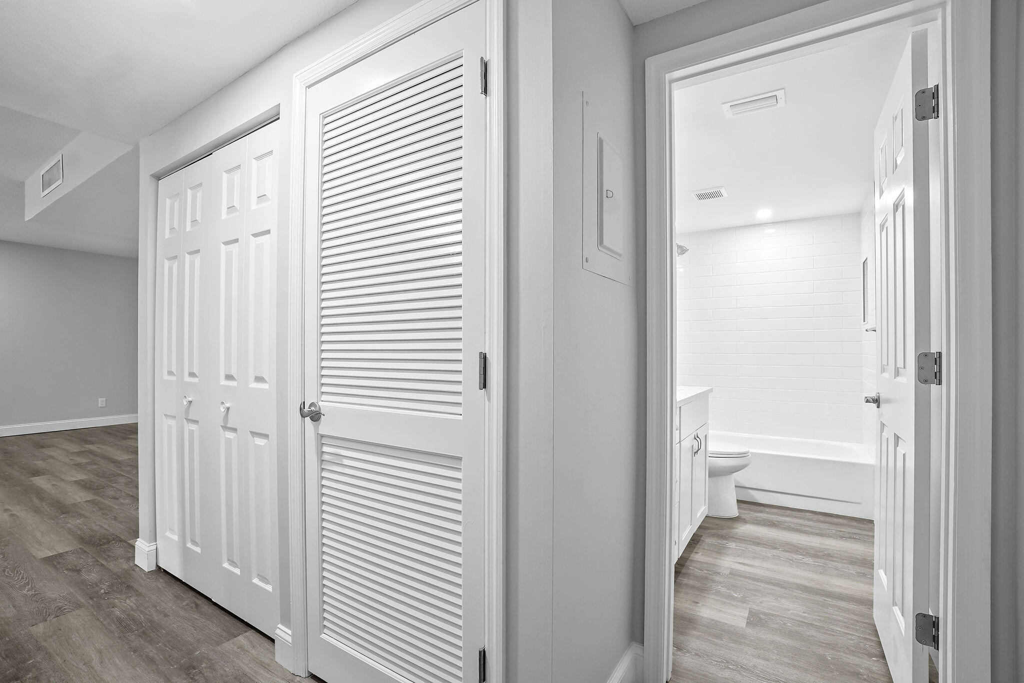 250 Southeast Four Winds Drive, Unit 204 Stuart, FL 34996 - Photo 19 of 32 a view of a bathroom from a hallway