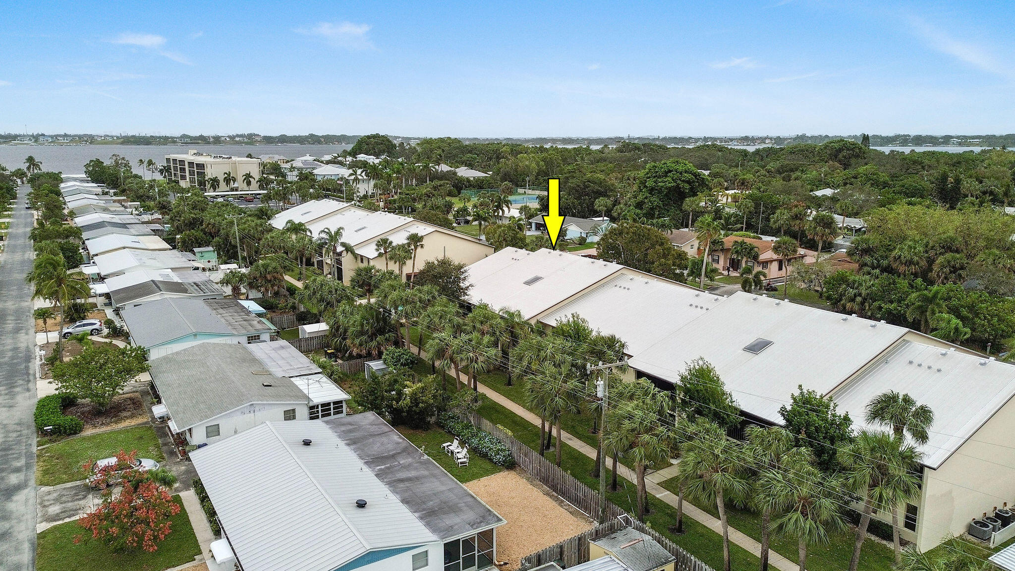 250 Southeast Four Winds Drive, Unit 204 Stuart, FL 34996 - Photo 27 of 32 an aerial view of a city with lots of residential buildings