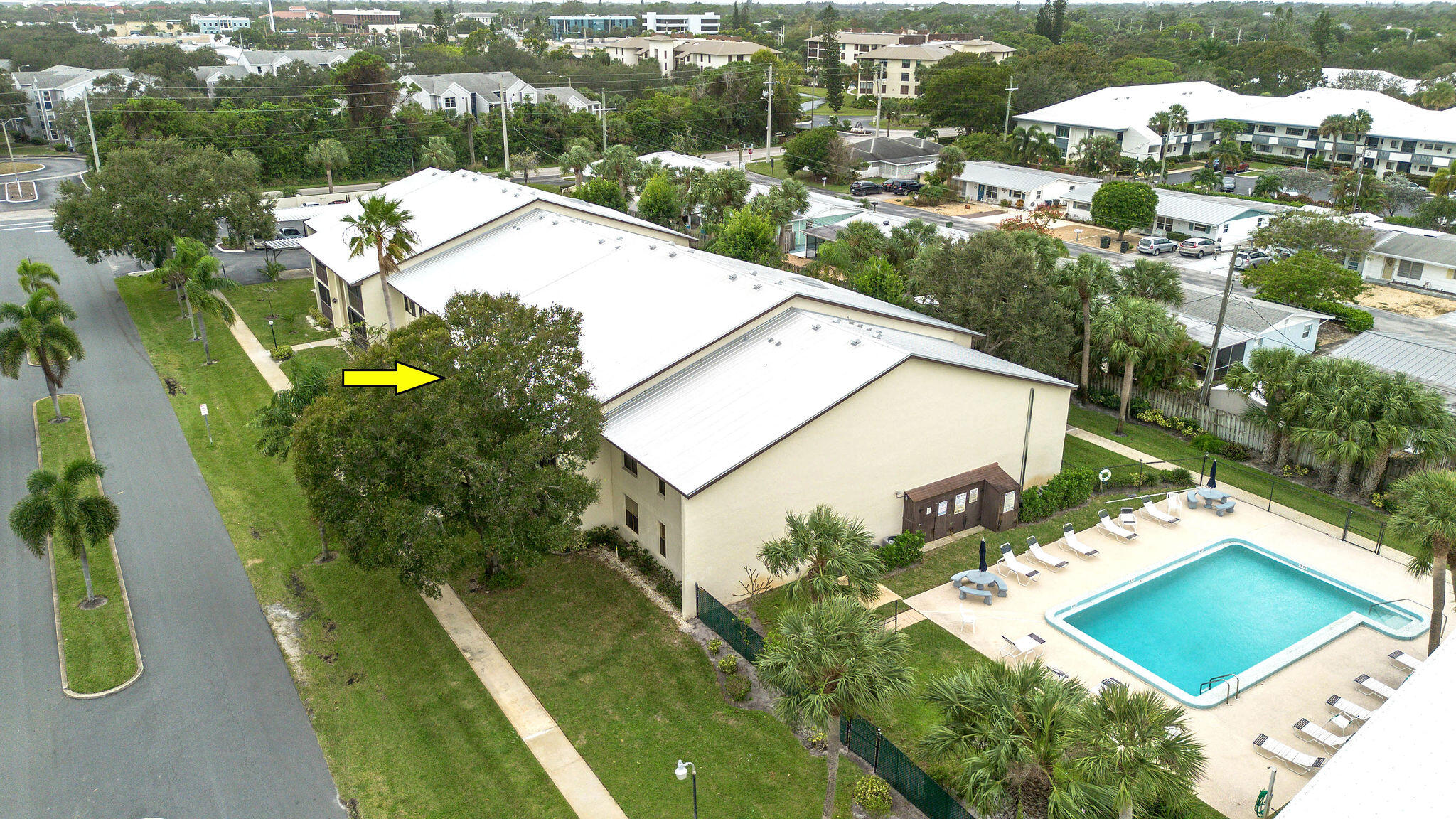 250 Southeast Four Winds Drive, Unit 204 Stuart, FL 34996 - Photo 31 of 32 an aerial view of a house with outdoor space