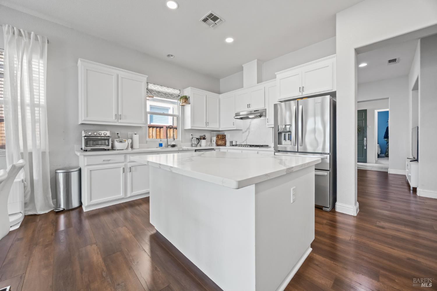 5161 Freitas Way Fairfield, CA 94533 - Photo 13 of 51 a kitchen with white cabinets and white appliances