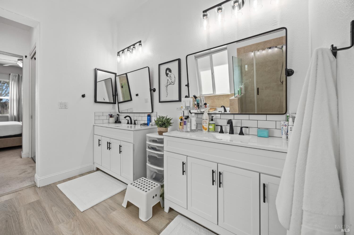 5161 Freitas Way Fairfield, CA 94533 - Photo 25 of 51 a spacious bathroom with a double vanity sink mirror and