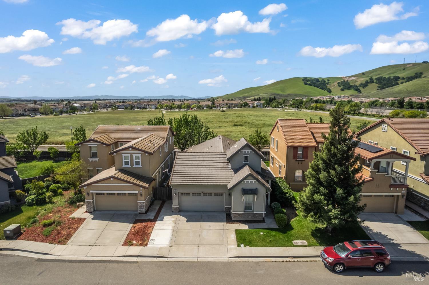 5161 Freitas Way Fairfield, CA 94533 - Photo 49 of 51 an aerial view of a house with a garden and lake view