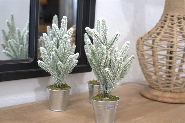 a bedroom with furniture and chandelier